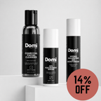 Three Domi Skincare products displayed on white pedestals against a light gray background: Charcoal Facial Cleanser, 12% Niacinamide Serum, and Hydro Balancing Gel Moisturizer, with a red circular '14% OFF' badge in the lower right.