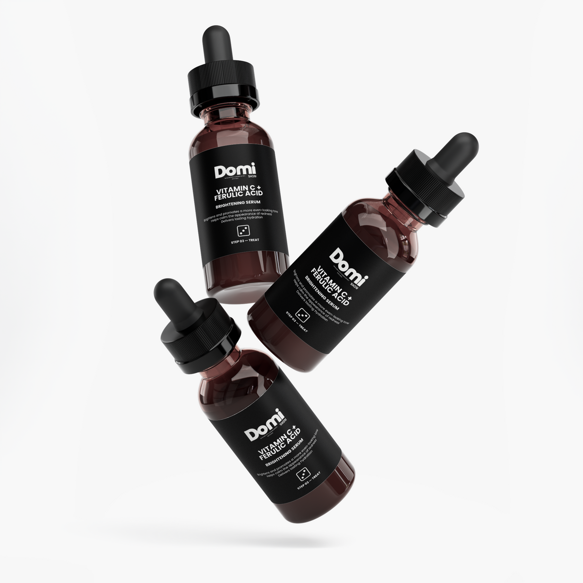 Three amber glass dropper bottles of Qforniq Vitamin C serum arranged diagonally on a light gray background.